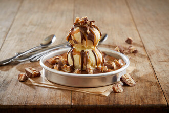 BJ's teams up with Mars to launch the SNICKERS® Pizookie®, a freshly baked brown-sugar cookie made with bits of SNICKERS® and topped with rich vanilla bean ice cream, chocolate shell topping, a drizzle of gooey caramel sauce and sprinkled with SNICKERS®. For more information, visit bjsrestaurants.com.